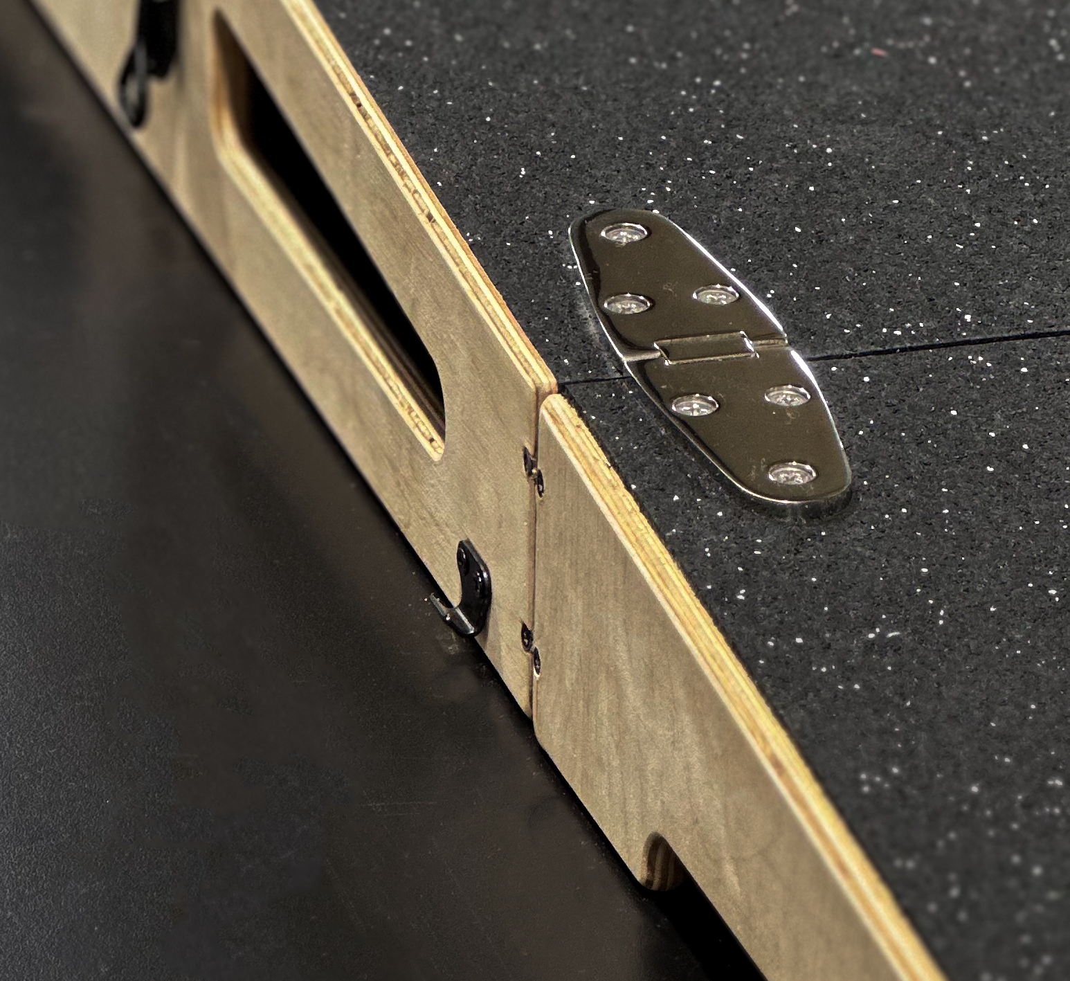 Velocity Wheeled 8-Inch Portable Pitching mound with a close up of our 316 stainless steel marine grade flush mount hinges.